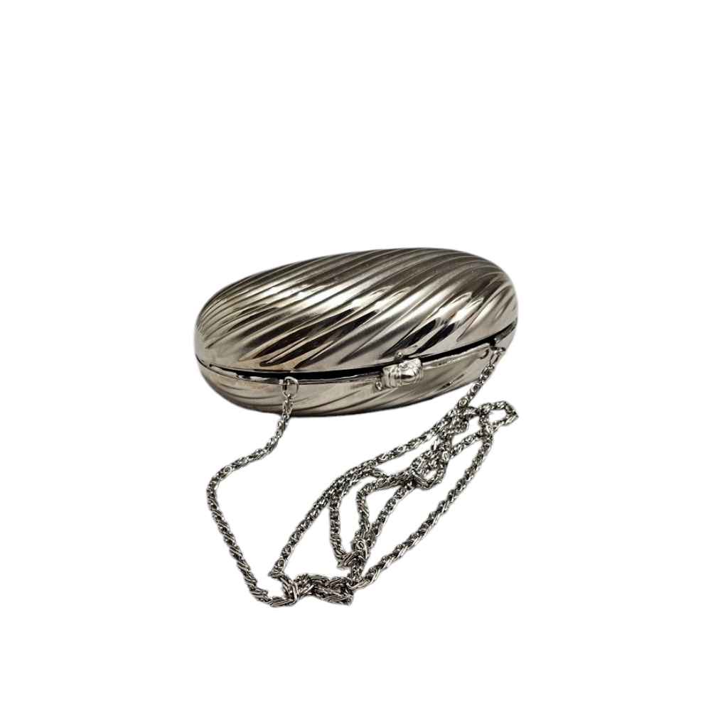 Evening bag, silver hard case.